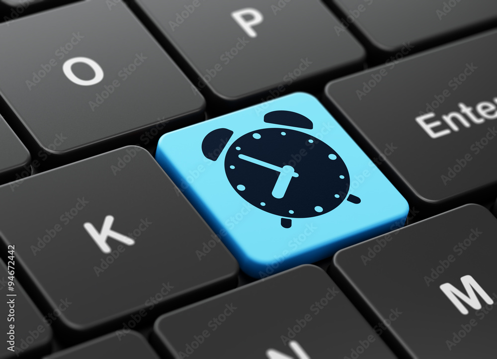 Time concept Alarm Clock on computer keyboard background Stock
