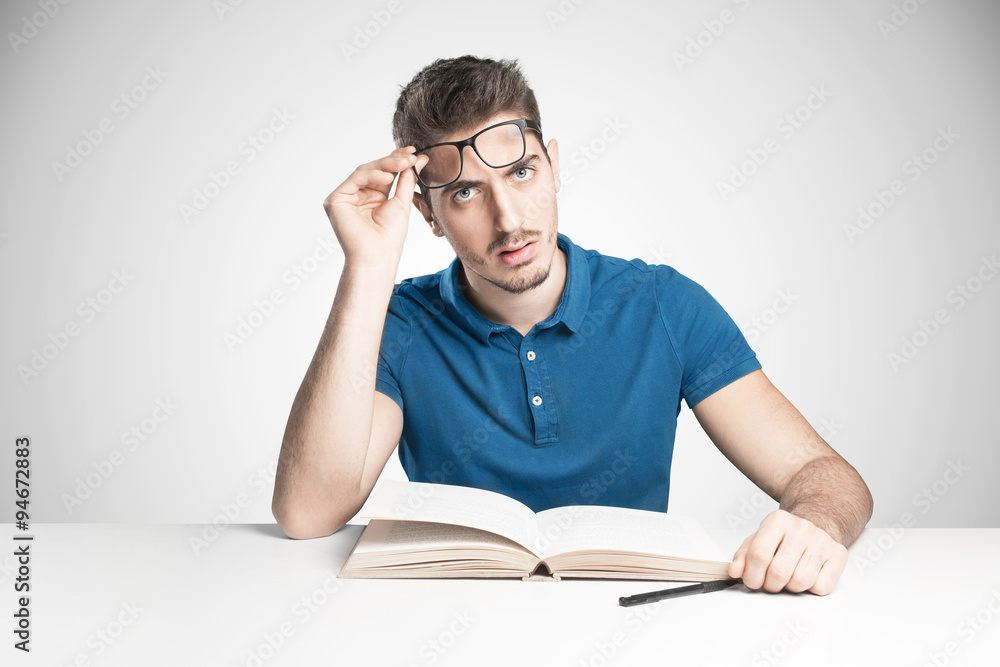 student confused don't understanding reading a book student confused don't understanding reading a book