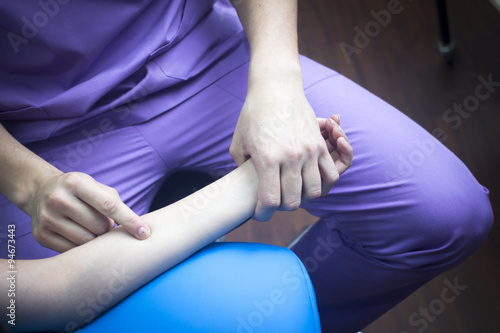 Physiotherapist massaging patient mobility injury © edwardolive