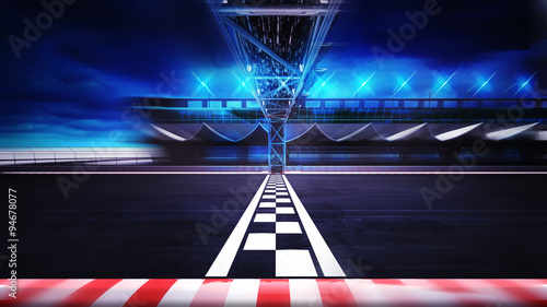 finish line on the racetrack in motion blur side view photo
