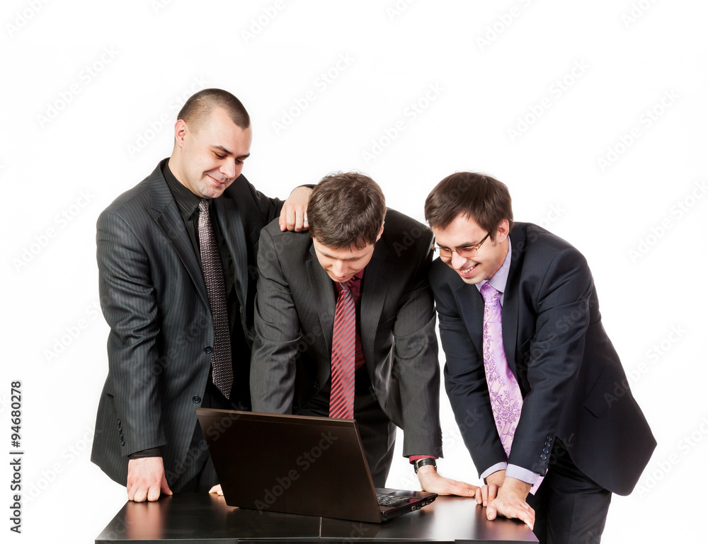 Three businessmen near laptop on business talk Three businessmen near laptop on business talk