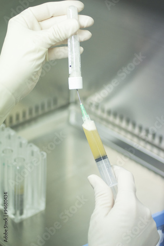 Laboratory technician prepares human growth factors