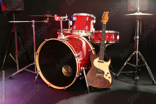 Musical instruments on a stage on dark background