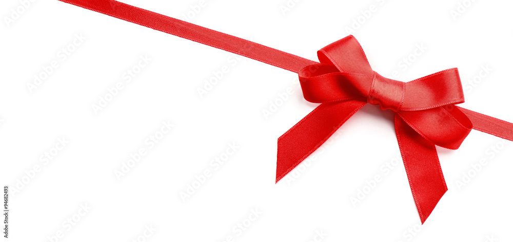 Shiny red ribbon with bow isolated on white Shiny red ribbon with bow isolated on white