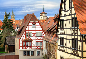 Traditional red tile roofs and half-timbered houses in Rothenbur