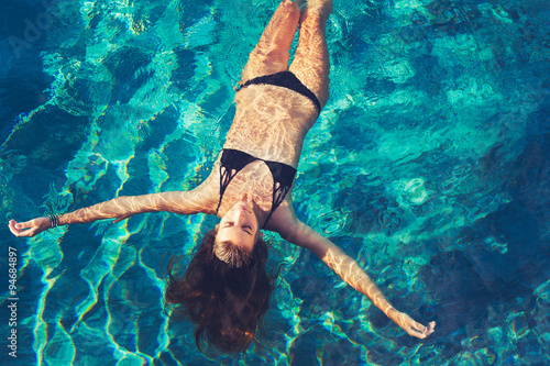 Woman Floating in Water Relaxing