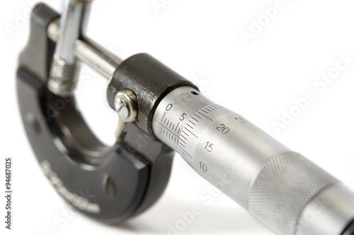 Bild auf Leinwand Micrometer/Used and dirty micrometer, device used to tiny measurements on white background