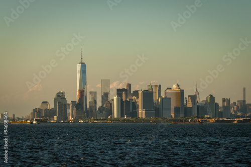 Northview image of the financial district in lower Manhattan seen from Staten Island during daytime © Victor Moussa