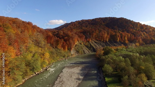 Aerial View Autumn Forest with Mountain River photo