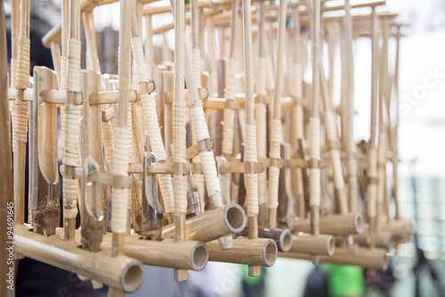 The angklung is a musical instrument made of two to four bamboo tubes attached to a bamboo frame.  photo