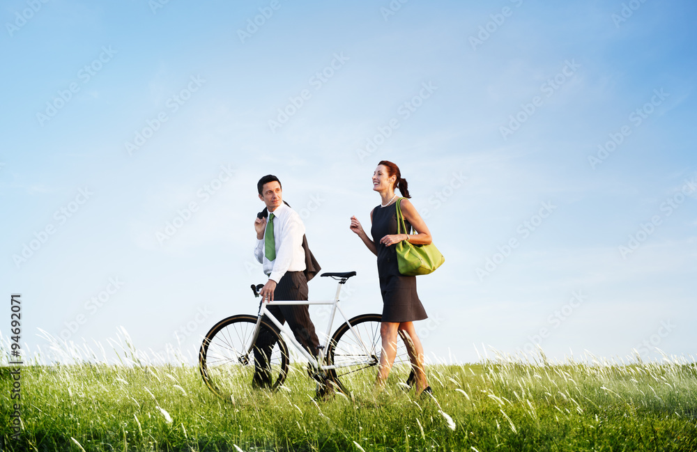 Business Man Woman Pushing Bike Concept Business Man Woman Pushing Bike Concept