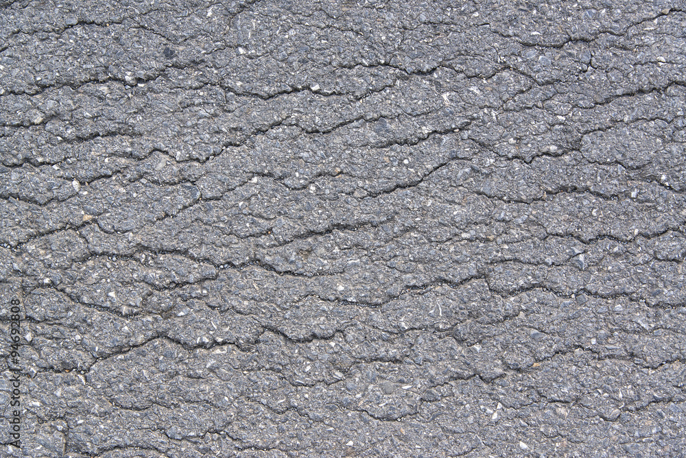 Sidewalk asphalt road with cracks Sidewalk asphalt road with cracks