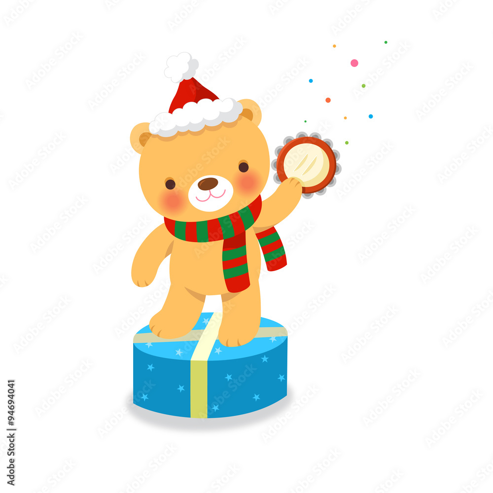 선물상자 위에서 탬버린을 연주하는 귀여운 곰