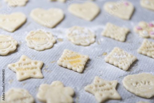 woman making ginger bread cookies in the kitchen