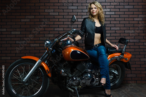 blond girl on a motorcycle