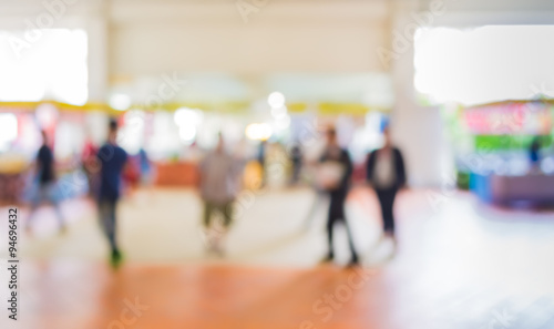 blurred image of people at trade show © coffmancmu