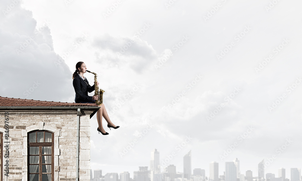 Woman saxophonist. Concept image Woman saxophonist. Concept image