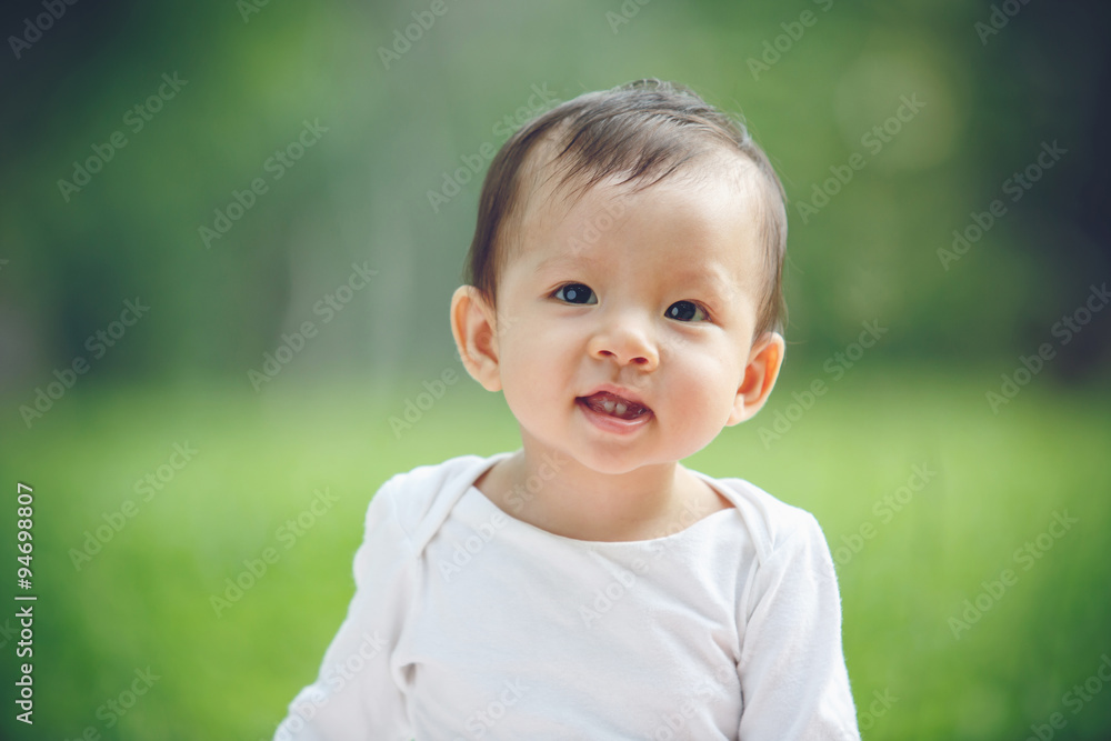 Asian child portrait in garden (soft focus on the eyes) Asian child portrait in garden (soft focus on the eyes)