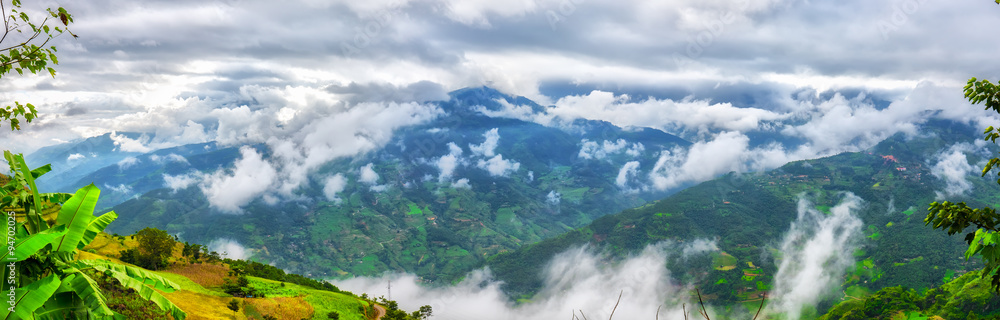 Clouds and Vietnam Northwest mountain with winding road side and the terraced mountains looming in the distance makes the scene very calm when arriving here Clouds and Vietnam Northwest mountain with winding road side and the terraced mountains looming in the distance makes the scene very calm when arriving here