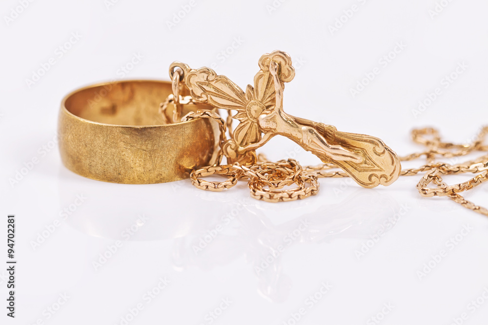 Wedding ring and gold Orthodox cross Wedding ring and gold Orthodox cross