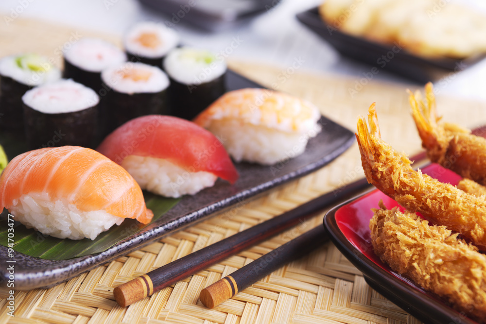 Shrimp tempura and various Japanese sushi on a plate Shrimp tempura and various Japanese sushi on a plate