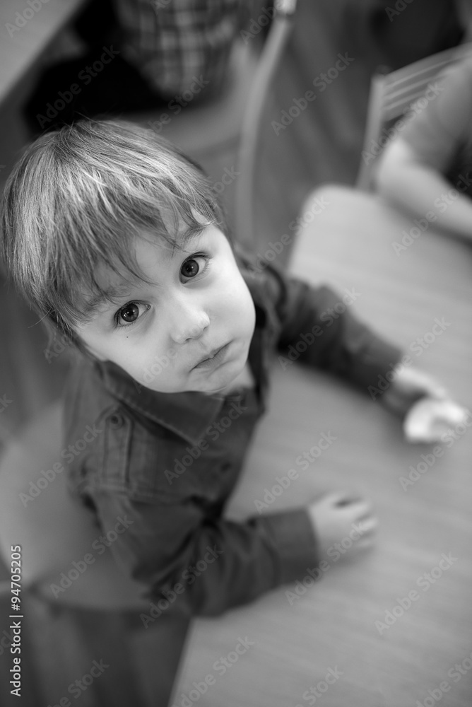 Fototapeta premium Children eating apple in kindergarten