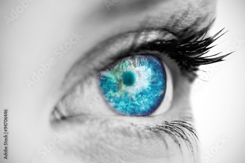 Fotografie Composite image of blue eye on female face