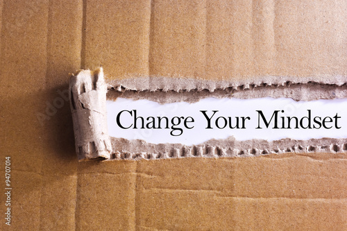 Torn paper box with word Change your mindset