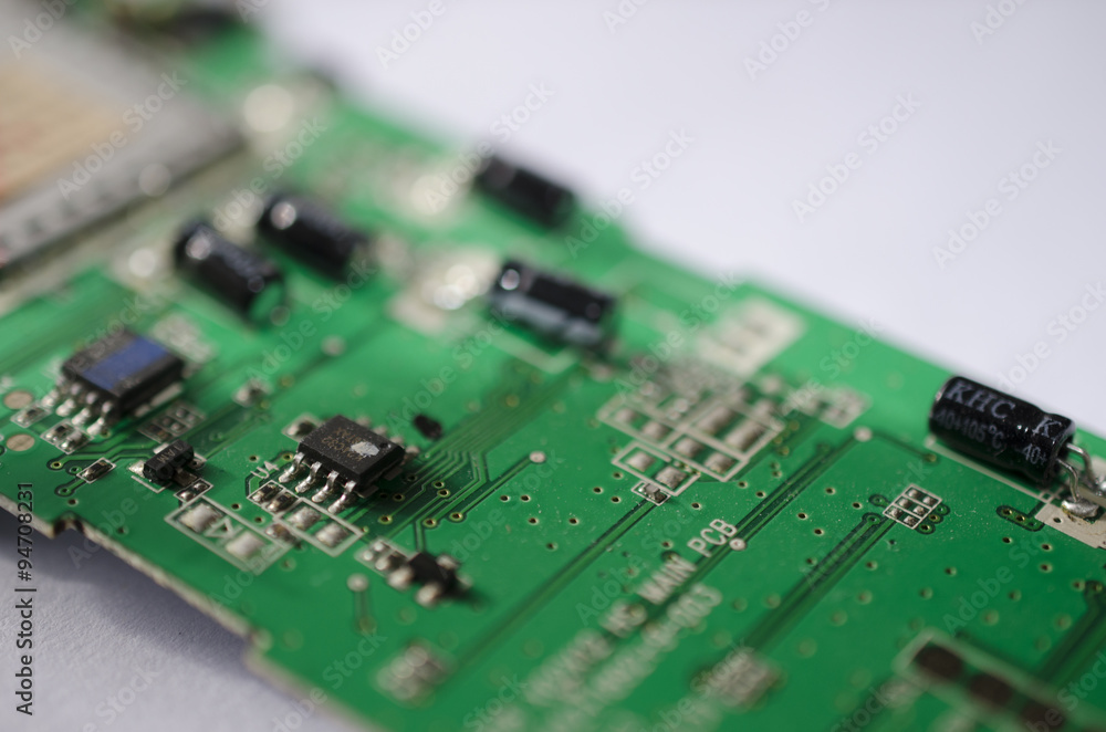 Microchip circuit board close up green on white background technology with bokeh
Microchip circuit board close up green on white background technology with bokeh