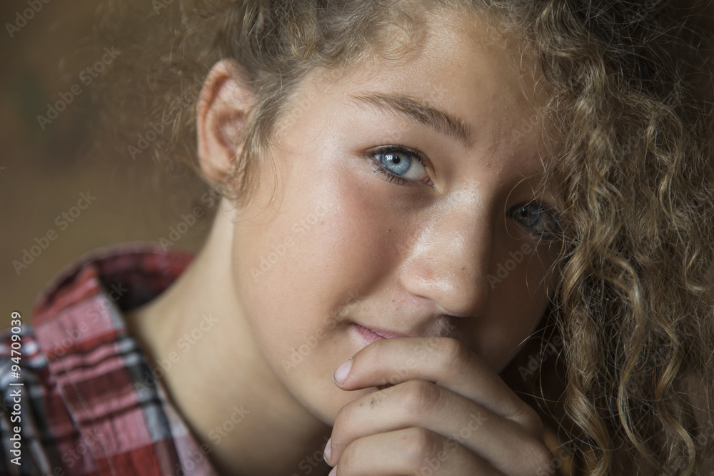 Portrait of beautiful young redhead girl wit blue eye Portrait of beautiful young redhead girl wit blue eye