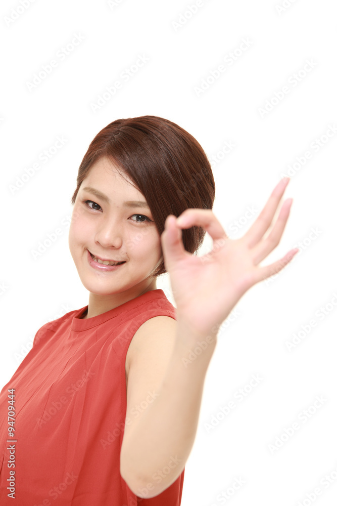 Japanese woman showing perfect sign Japanese woman showing perfect sign