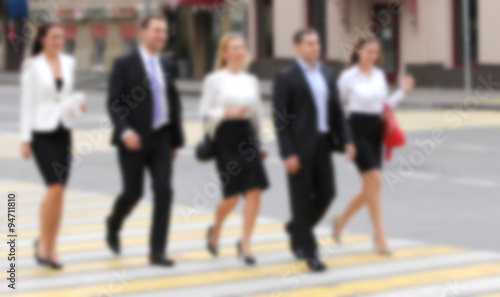 Business People crossing the street, creative abstract blur back