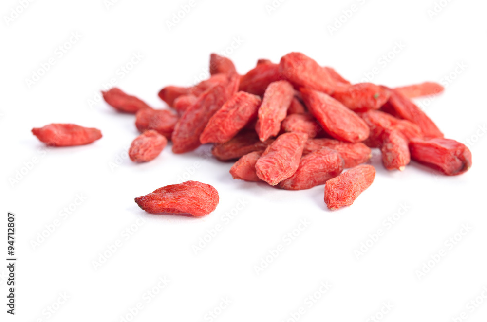 heap of goji berries isolated on white background heap of goji berries isolated on white background