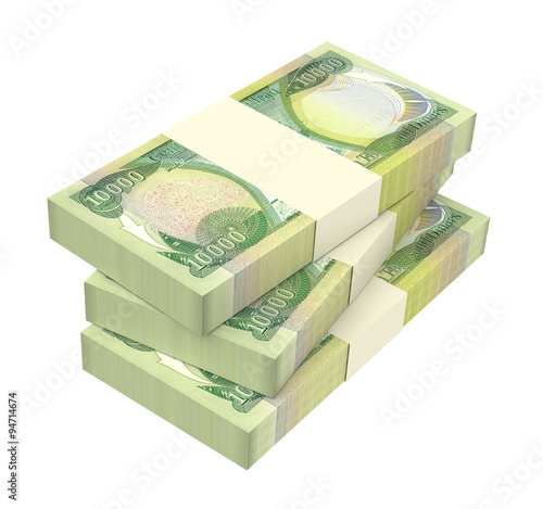 Iraq dinars bills isolated on white background. Computer generated 3D photo rendering