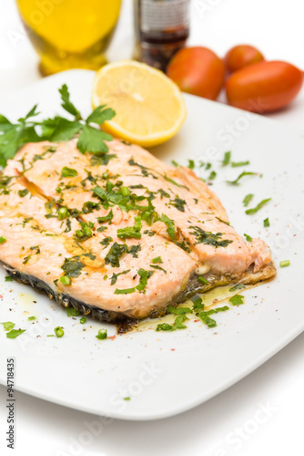 Poached salmon with extra virgin olive oil and parsley 