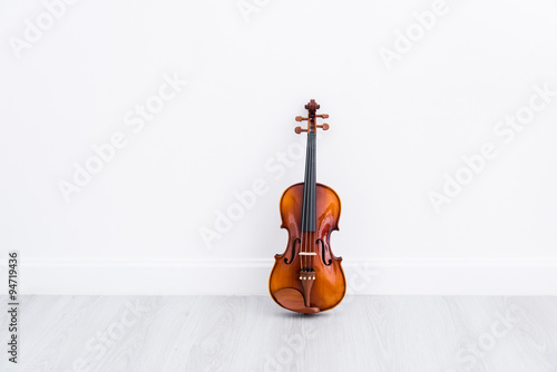 Classical cello on white wall background