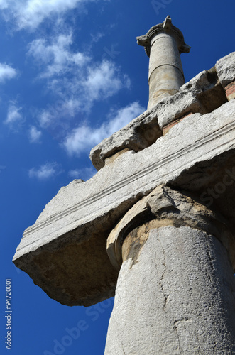 Columns of an ancient temple in Pompeii against the sky



 photo