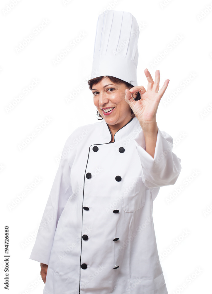 portrait of a mature woman ready to cook over white portrait of a mature woman ready to cook over white