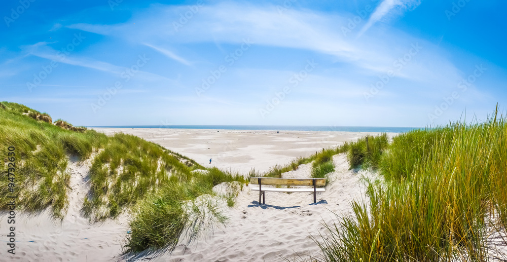 Beautiful tranquil dune landscape at long North Sea beach
