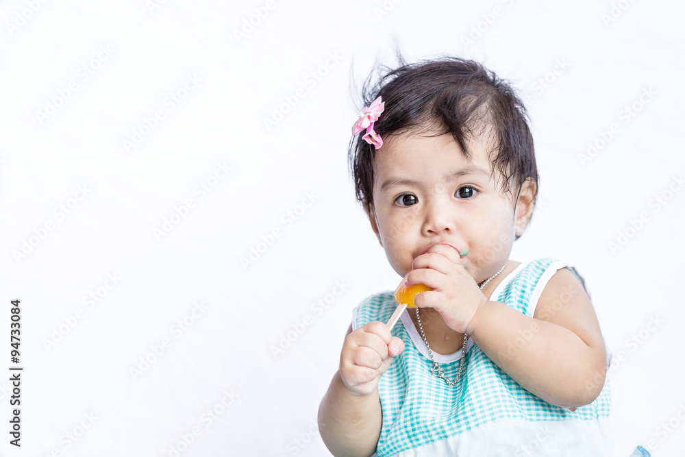 Asian baby eating ice cream after she stop crying Asian baby eating ice cream after she stop crying