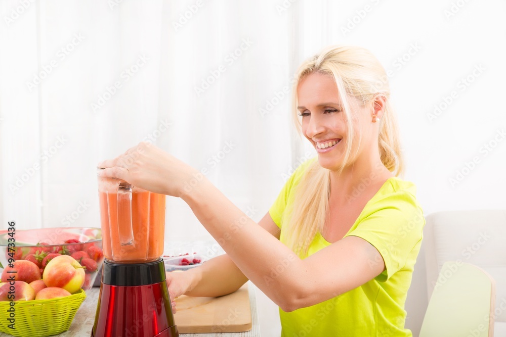 Mature woman enjoying a smoothie Mature woman enjoying a smoothie
