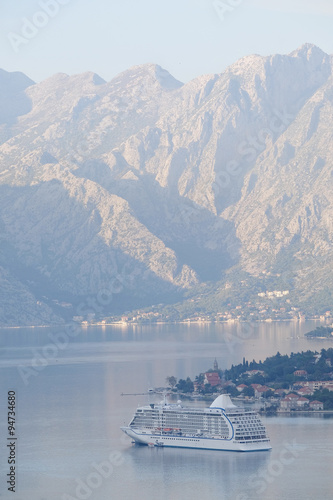 Landscape with the image of cruise liner in Kotor Bay, Montenegro