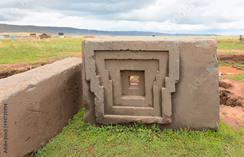 Megalithic stone with intricate carving in the complex Puma Punku, Bolivia photo