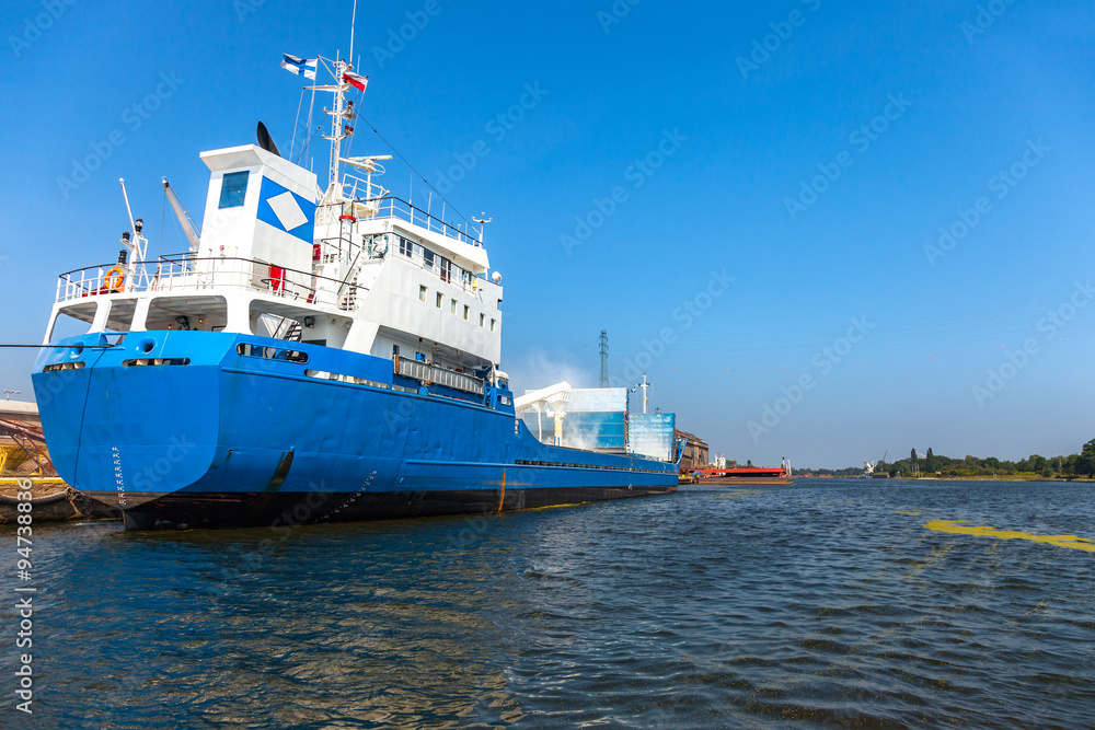 Loading bulk fertilizers in the port of Gdansk, Poland.