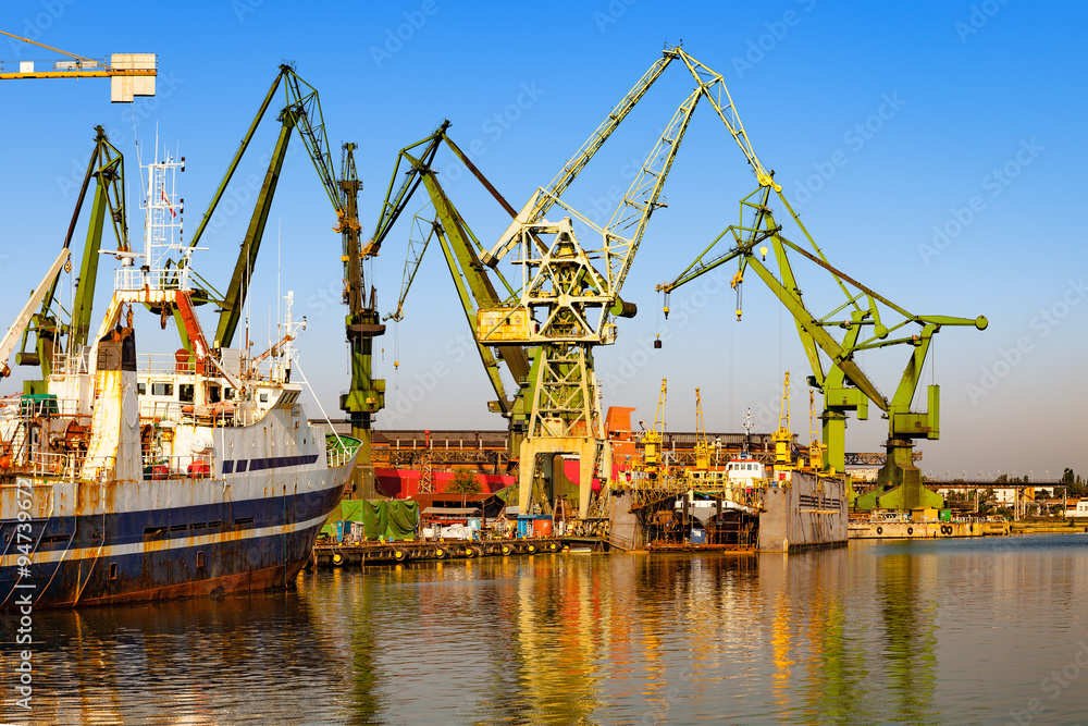 Ships moored at the quay in shipyard of Gdansk, Poland.