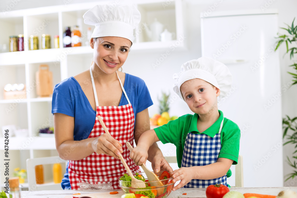 Mother and child cooking together Mother and child cooking together