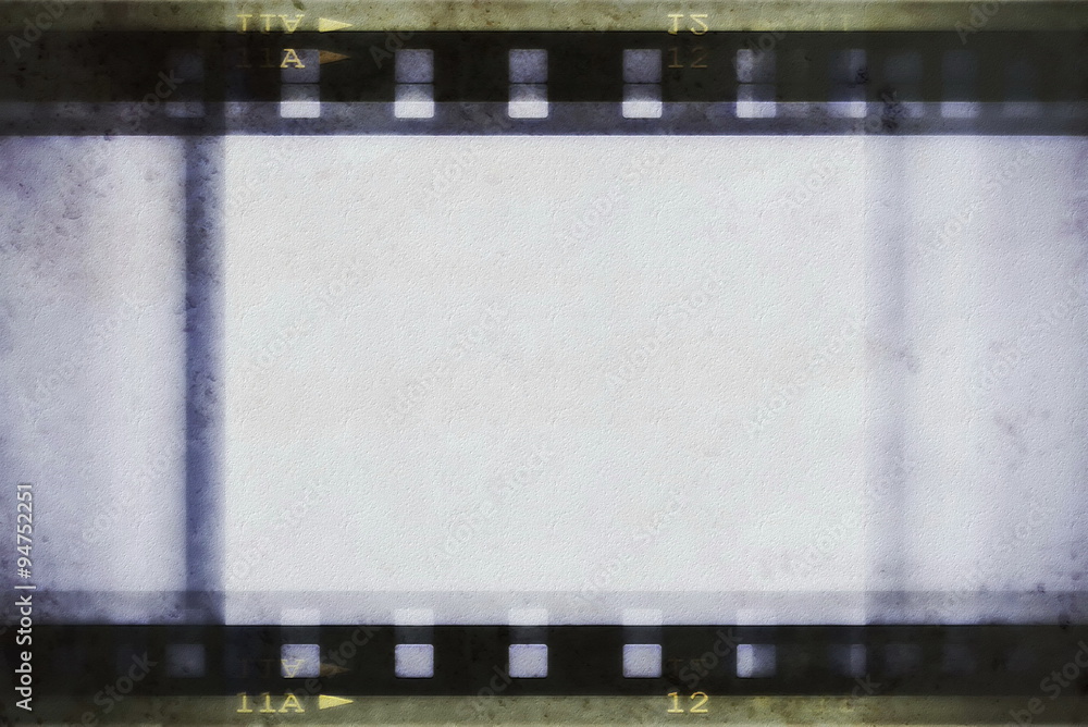 Naklejka premium retro grunge film strip background