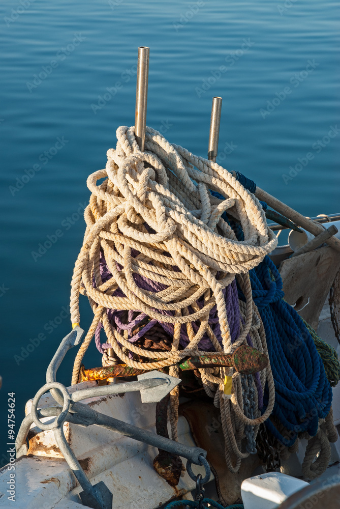 Ropes and anchor on traditional fishing boat in Peloponnese, Greece