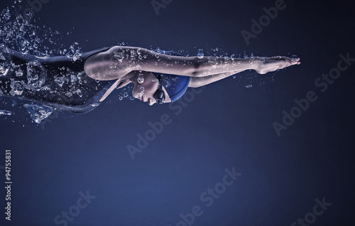 Obraz na plátně Female swimmer. Concept image