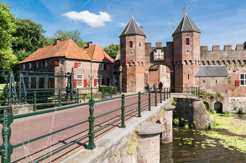 Medieval fortress city wall gate Koppelpoort and Eem River in the city of Amersfoort  Netherlands